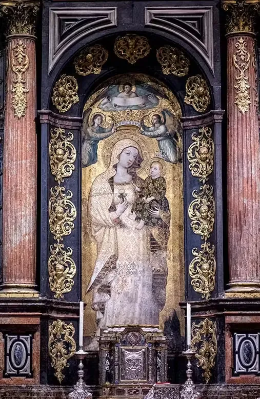 Close-up of the Gothic painting of Our Lady of La Antigua crowned by angels, Seville Cathedral